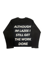 A black long-sleeve crewneck sweatshirt with bold white text on the back reading 'ALTHOUGH IM LAZEE I STILL GET THE WORK DONE'.
